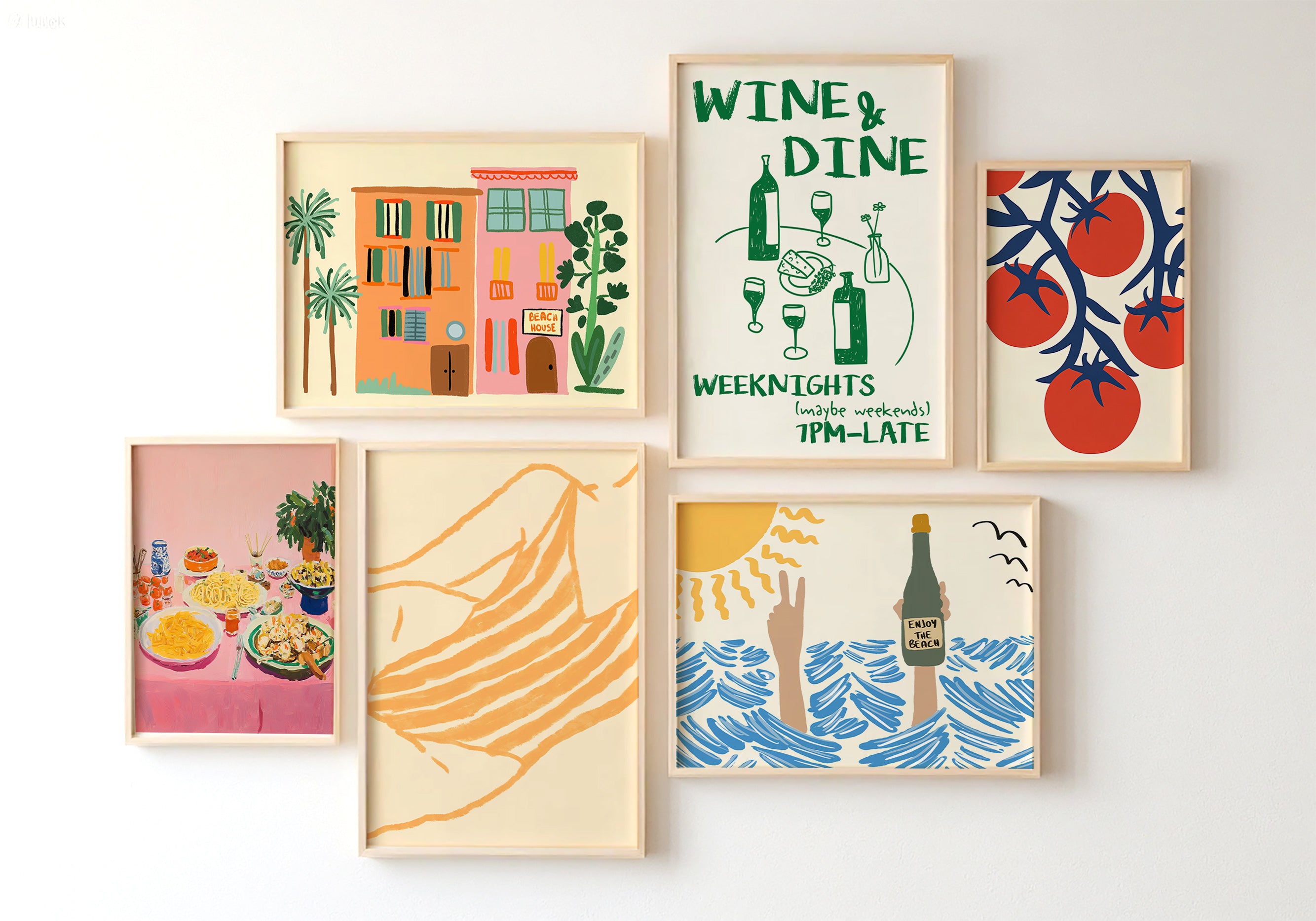 Set of framed prints on a white wall